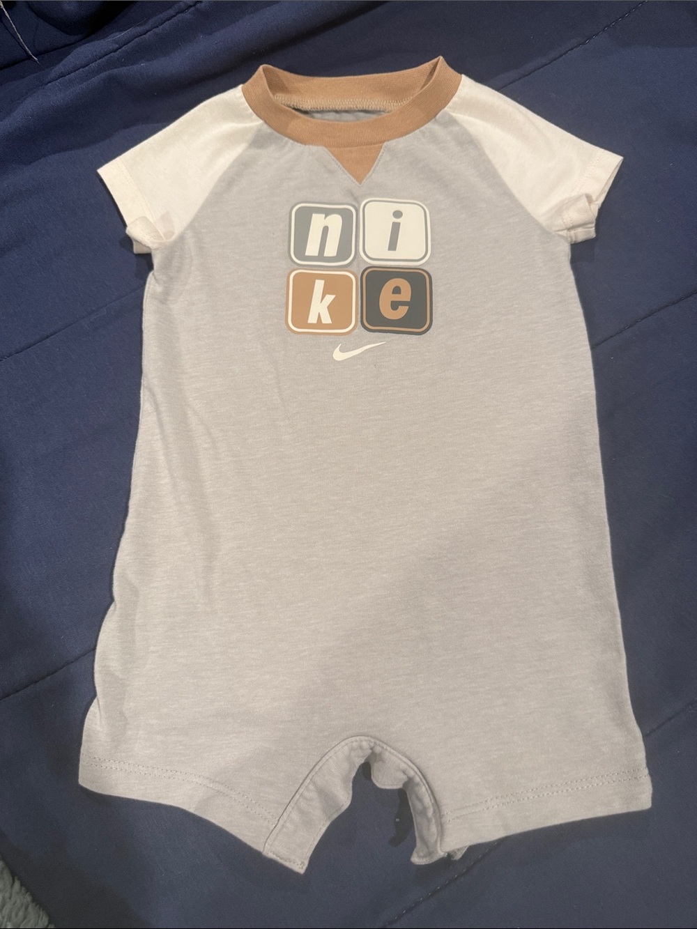 Nike Short-Sleeve One-Piece Romper in Light Gray, White and Tan